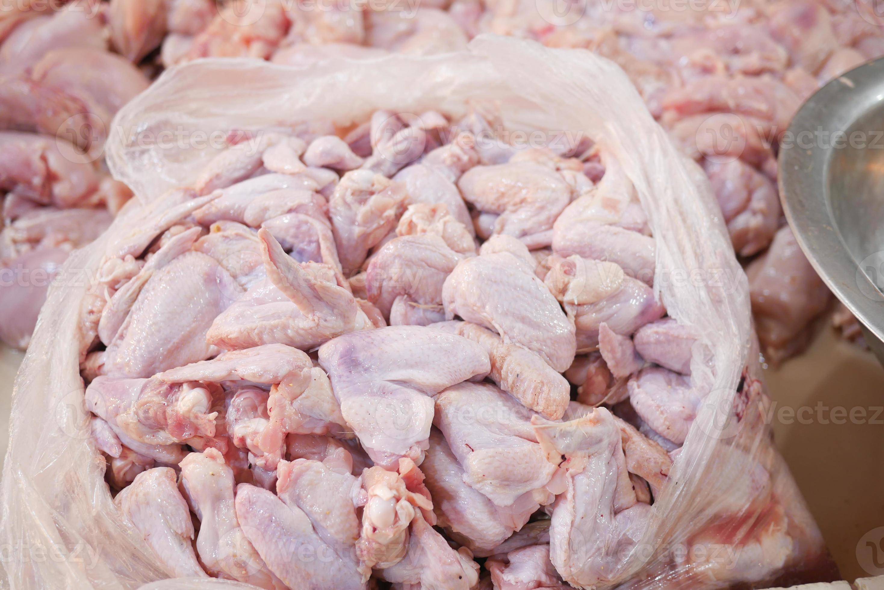 stack of many raw chicken meat 14441800 Stock Photo at Vecteezy
