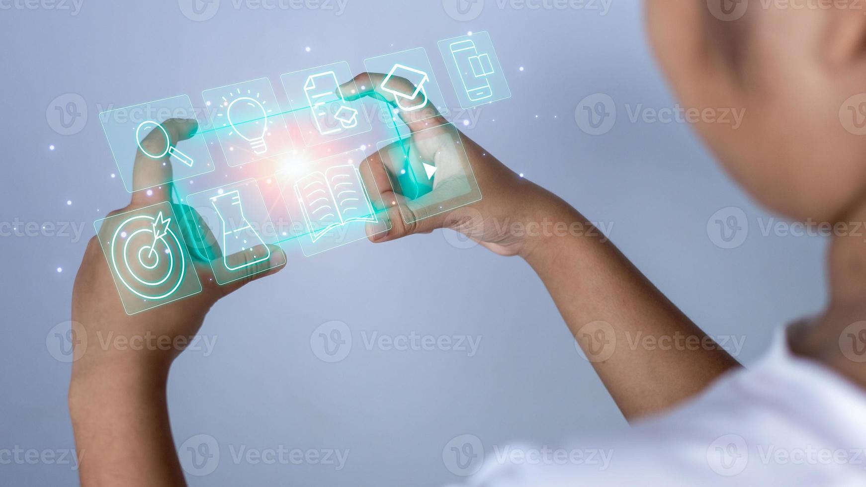 Educational concept picture. A girl stands holding an education icon representing creativity and innovation. Guidelines for searching for educational information. copy space photo