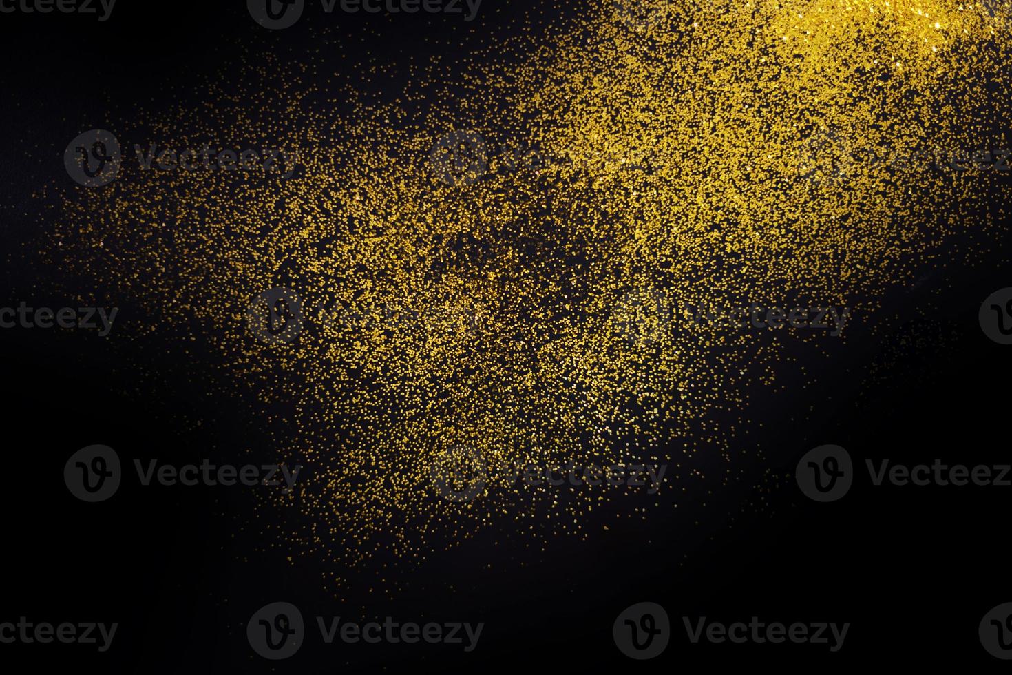 Dark texture with a sprinkling of gold. Backdrop with golden sparkle for overlay photo effect filters. fancy, luxury, themed backgrounds.
