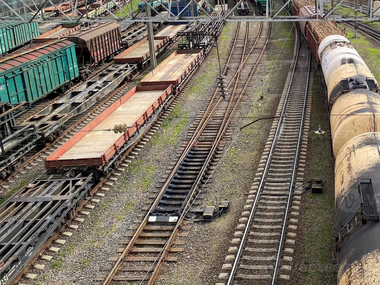 Railway station with freight trains. In the center is a train tanks photo