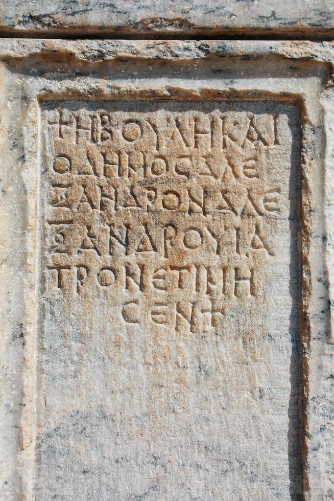 Stone plate with inscriptions in ancient city Hierapolis photo