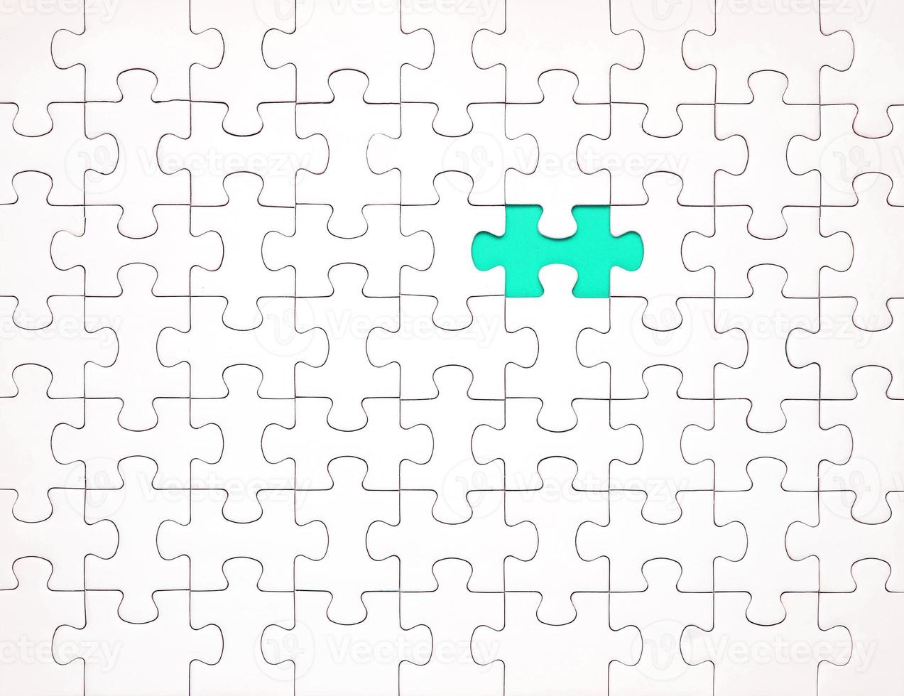 White puzzle pieces on blue background. Background for content photo