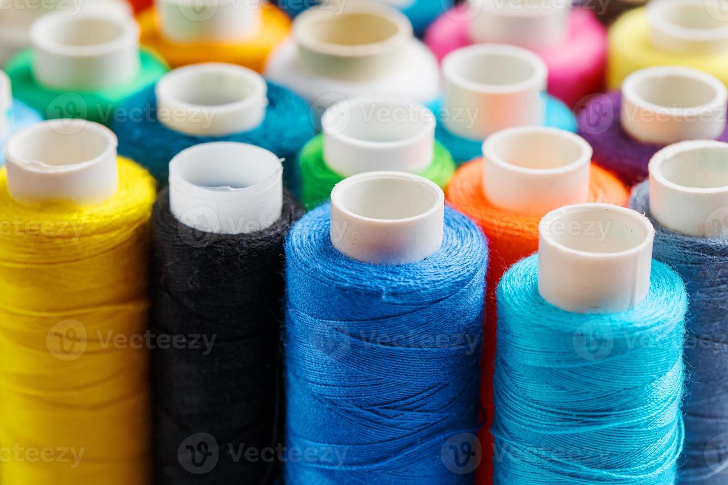 Colorful spools of sewing thread. Colored thread for sewing photo