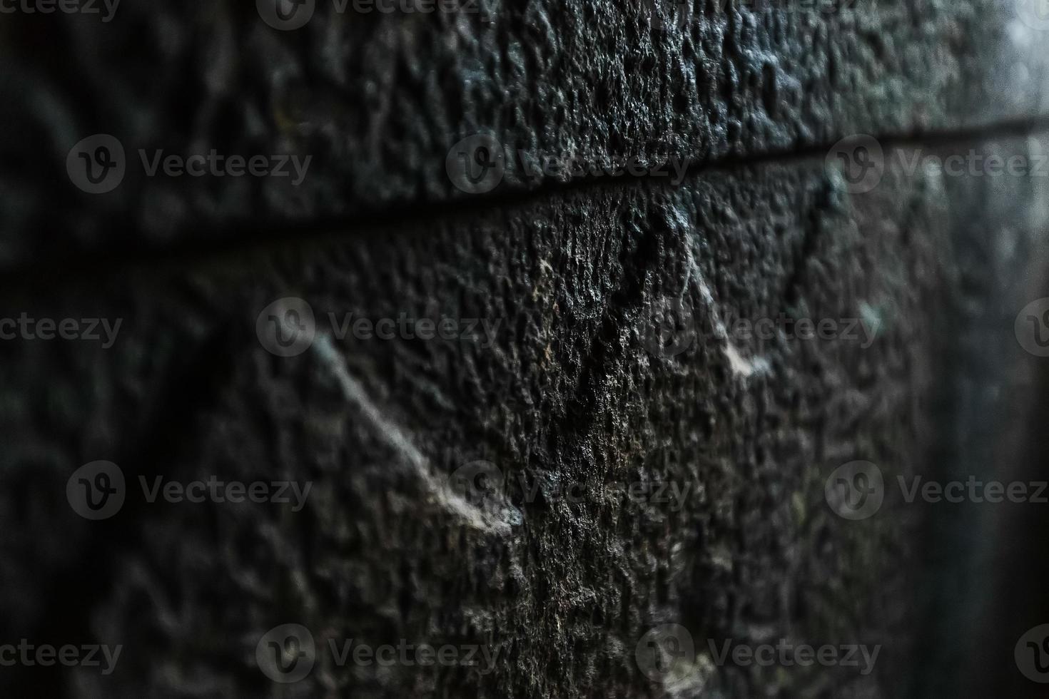 Figure in the form of a wave inside the wall of the dolmen. Interior view of a stone dolmen photo