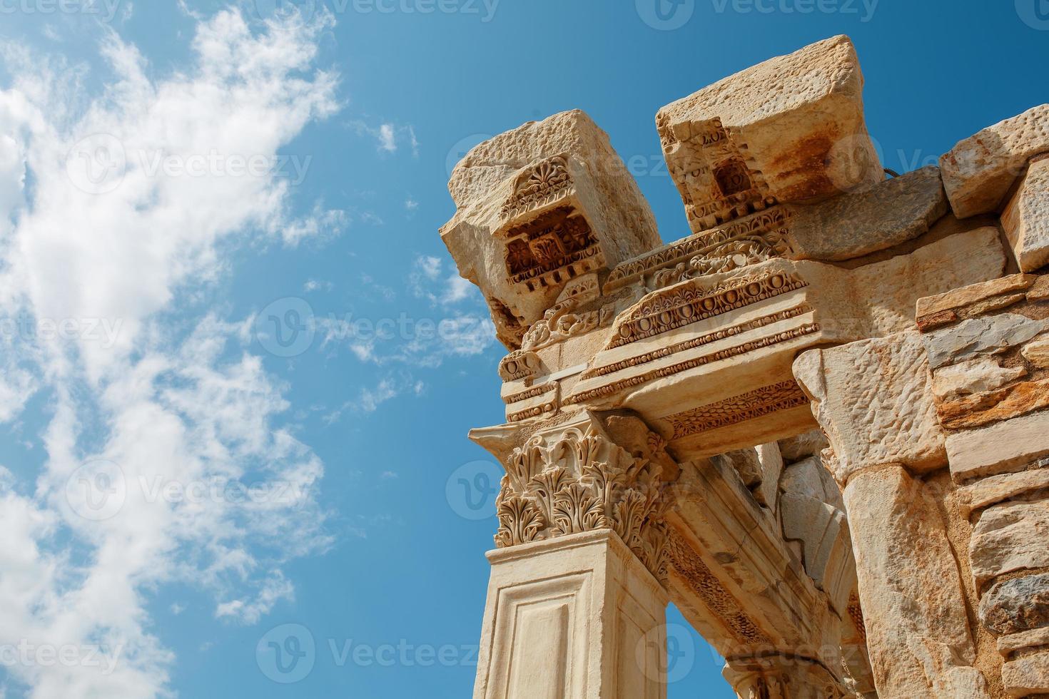 The ruins and ruins of the ancient city of Ephesus against the blue sky on a sunny day. photo