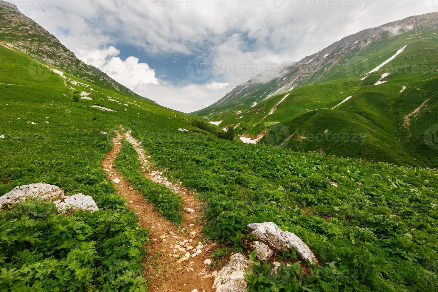 Stony path to the mountains through the pass Fisht-Oshten. photo