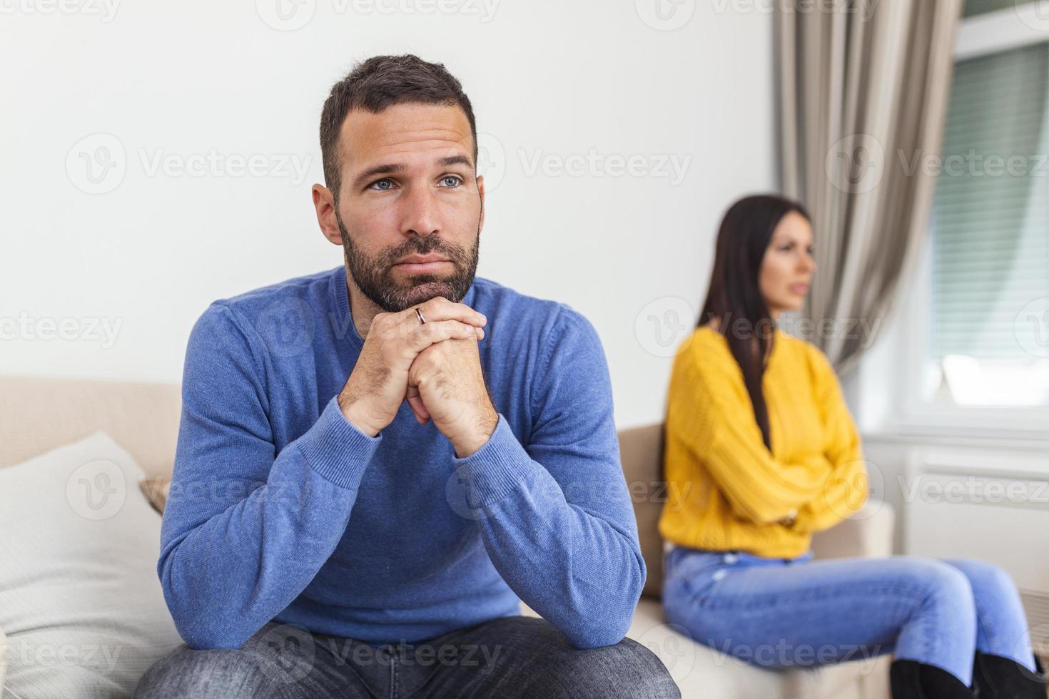 Young couple in conflict, man and woman fight. Furious couple arguing while having problems in their relationship. Young couple arguing while having problems in their relationship. photo