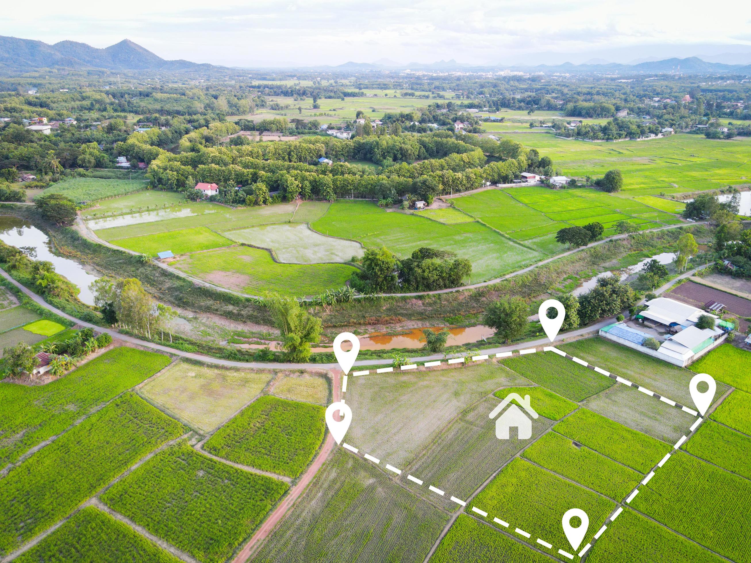 Land plot for building house aerial view, land field with pins, pin