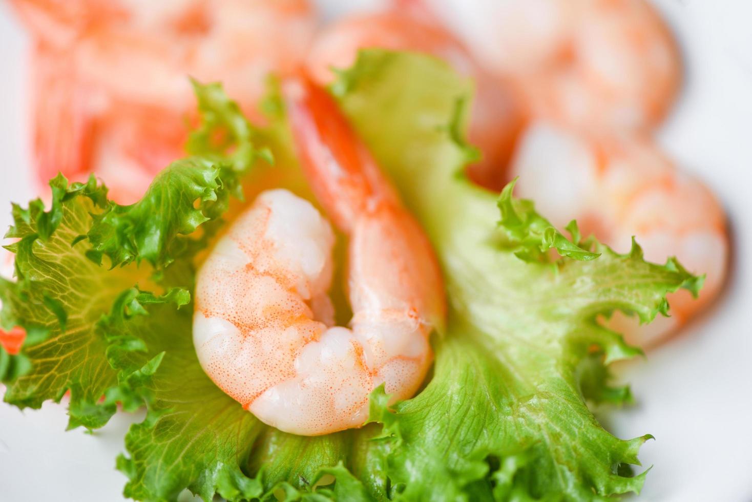 Salad shrimp seafood shelfish, fresh shrimps prawns on vegetable lettuce healthy food photo