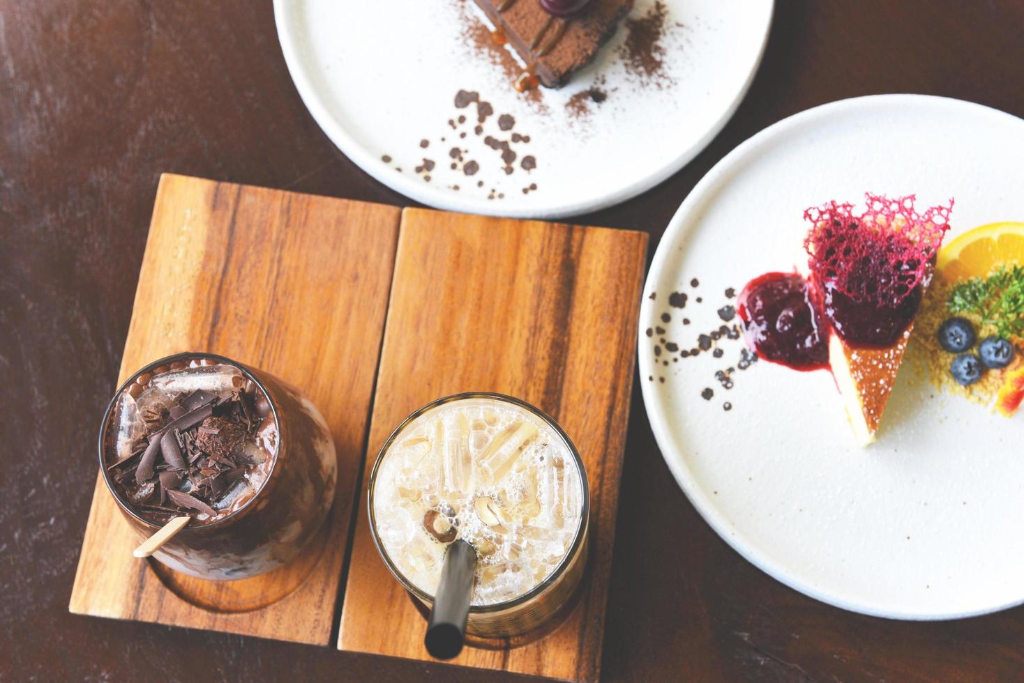 Cocoa drink chocolate and Bubble milk tea or Taiwan milk tea in glass on the wooden table with cake photo