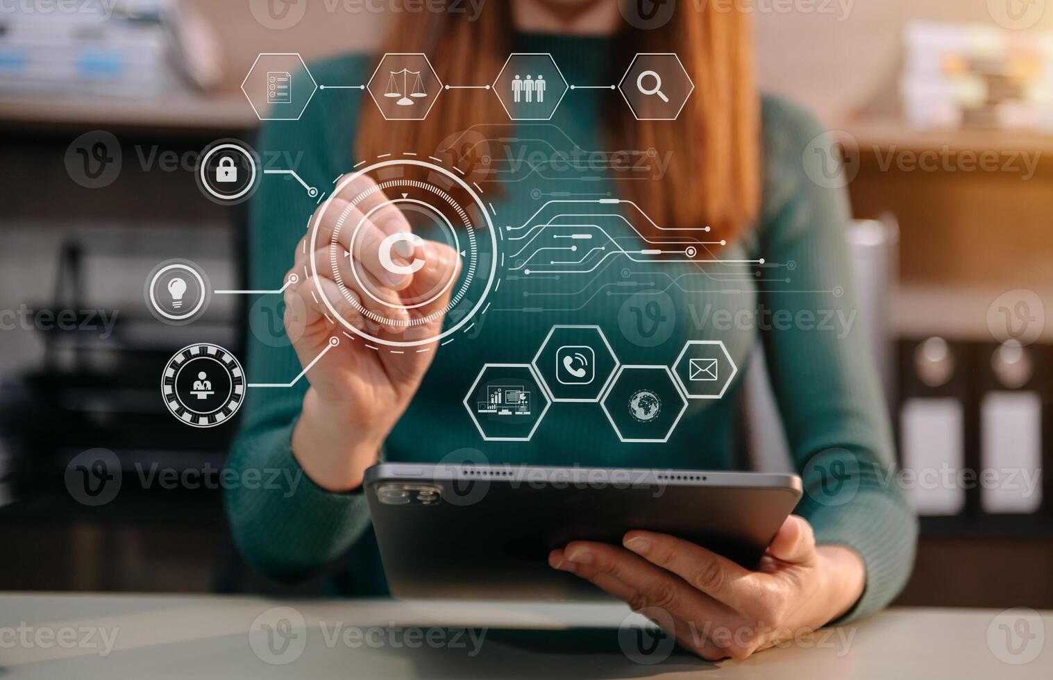 Copyright or patent concept, Person hand using laptop computer, tablet and smartphone with virtual screen copyright icon trademark, Creation ownership against piracy. photo