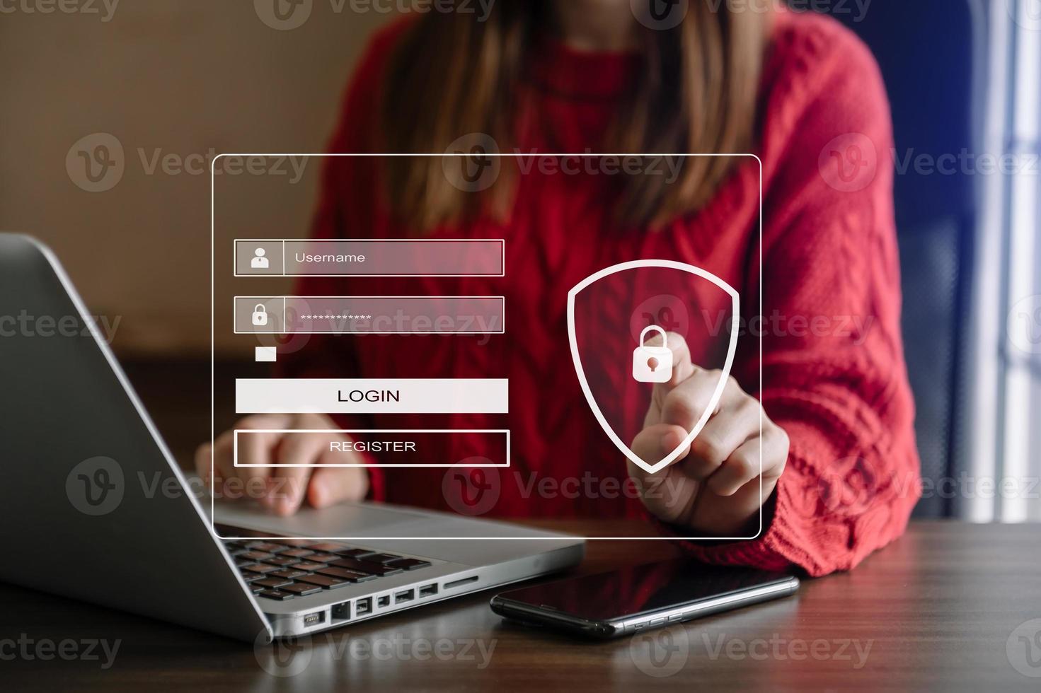 Cyber security concept, Login, User, identification information security and encryption, secure access to user's personal information woman using smart phone and tablet in office photo