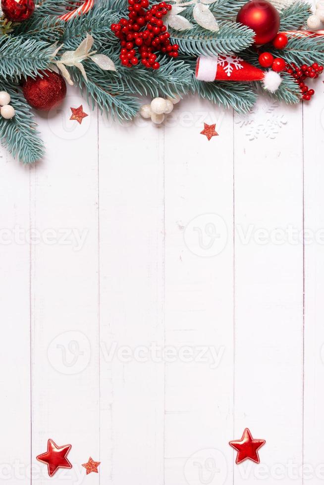 Christmas composition made from pine tree, stars and festive decorations top view. Christmas flat lay background copy space photo