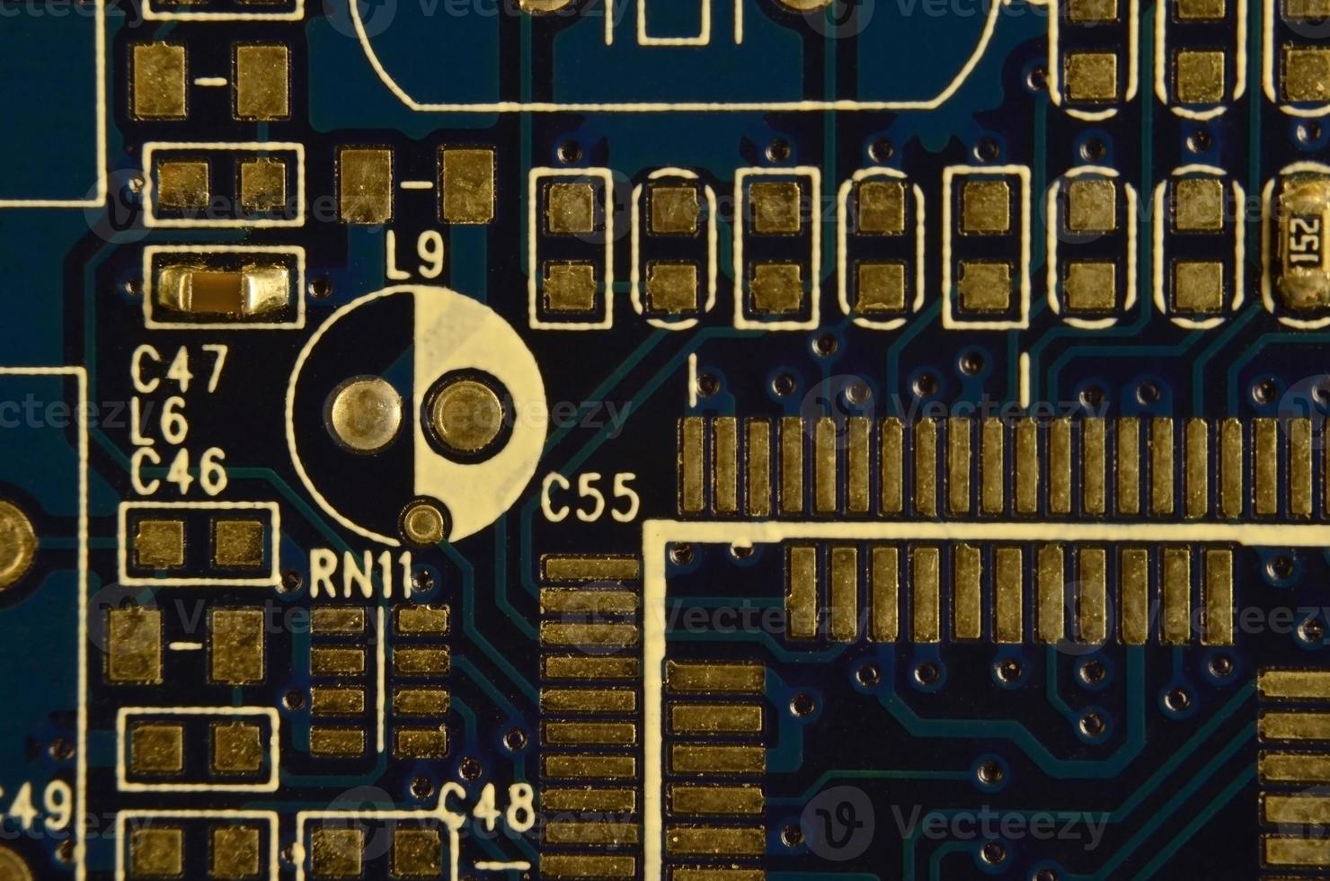 Close up of colored micro circuit board. Abstract technology background photo