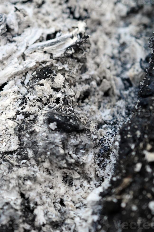 Pile of ashes after the fire went out grunge background texture photo