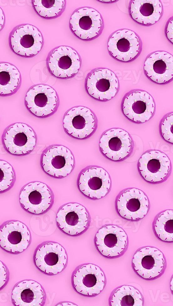 Many small plastic donuts lies on a pastel colorful background. Flat lay minimal pattern. Top view photo
