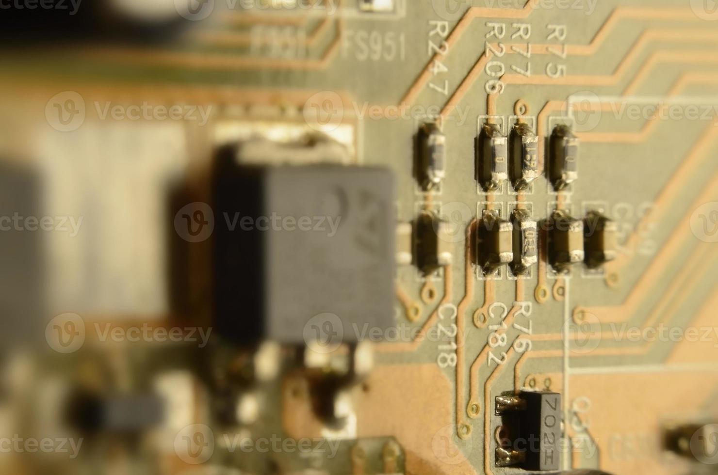 Close up of colored micro circuit board. Abstract technology background photo