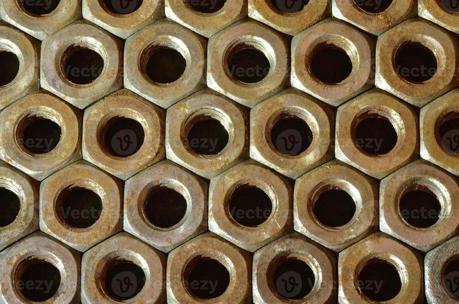 Close-up of rusty nuts photo