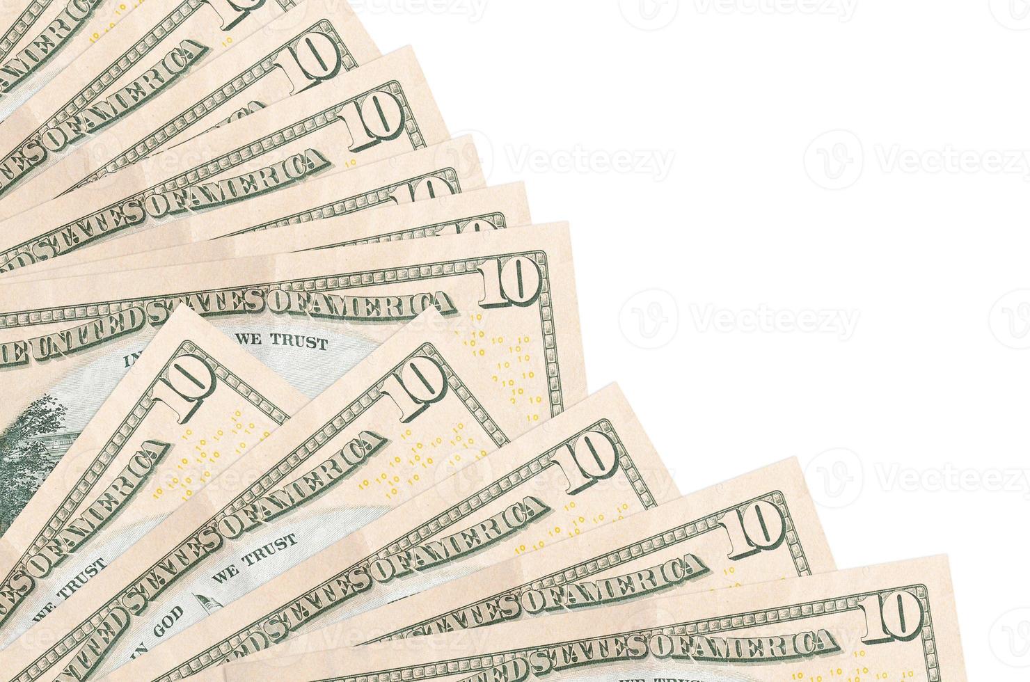 10 US dollars bills lies isolated on white background with copy space stacked in fan close up photo