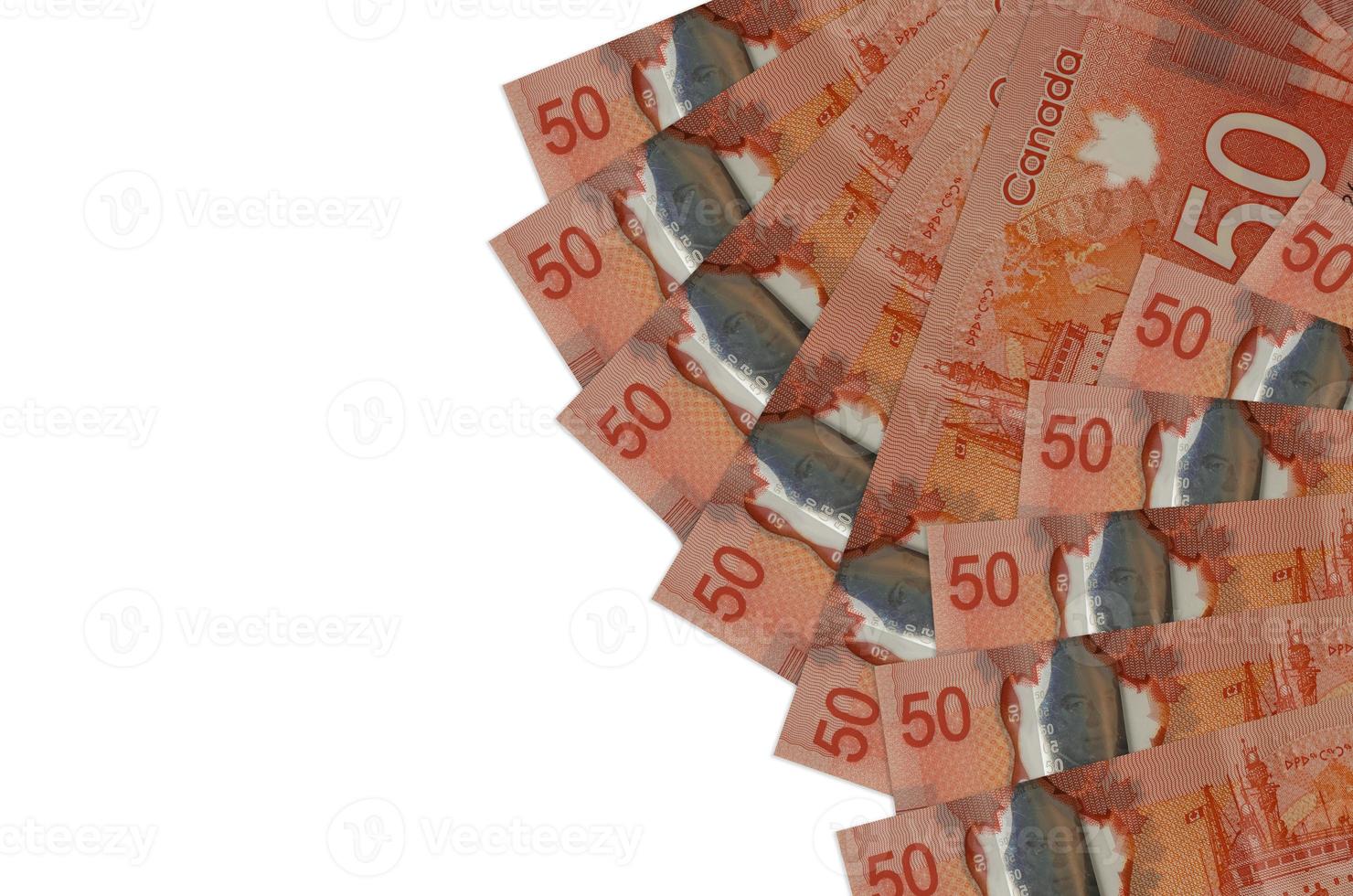 Los billetes de 50 dólares canadienses se encuentran aislados en fondo blanco con espacio de copia. fondo conceptual de vida rica foto