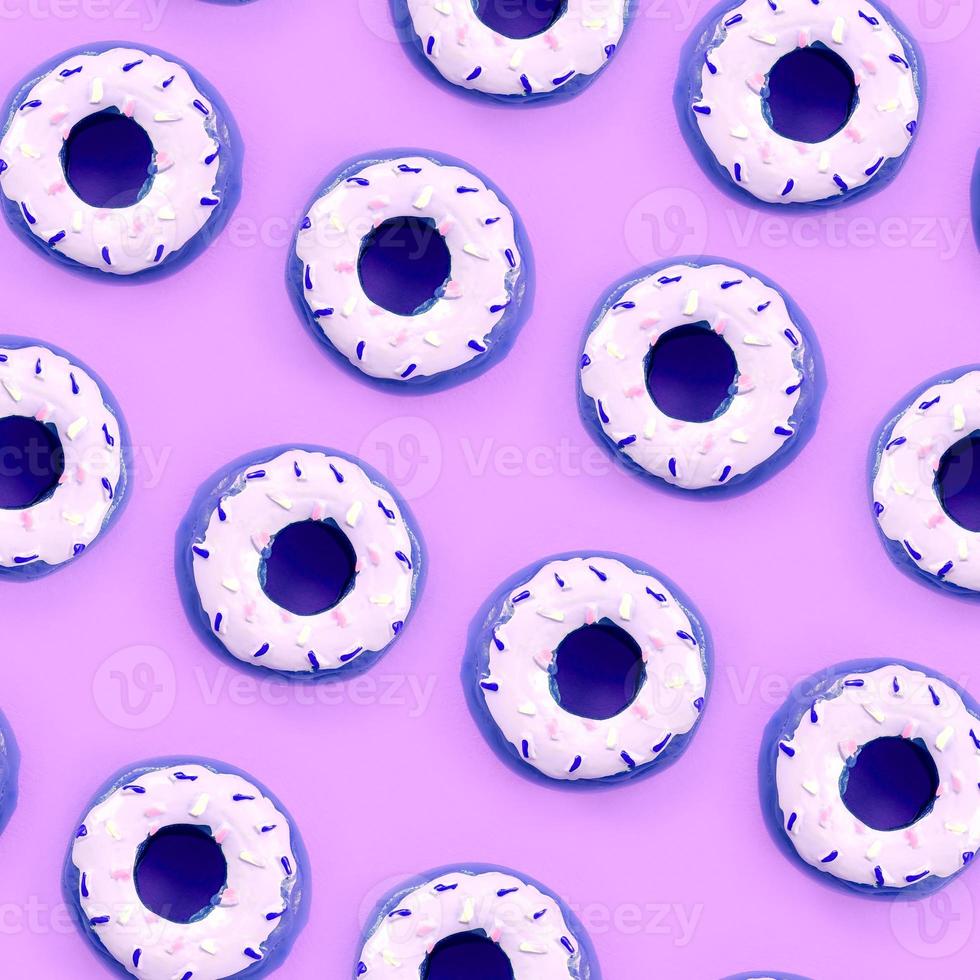 Many small plastic donuts lies on a pastel colorful background. Flat lay minimal pattern. Top view photo