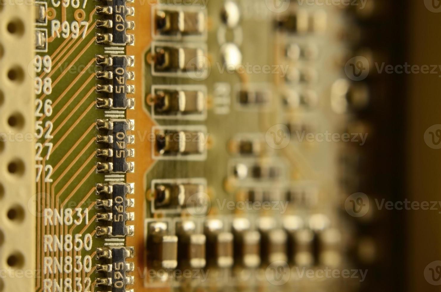 Close up of colored micro circuit board. Abstract technology background photo