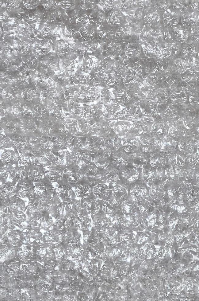 White bubble Wrap Packing Or Air Cushion material. Abstract Texture For Creative Art Work, Close Up dfckground, Top View with Copy Space photo
