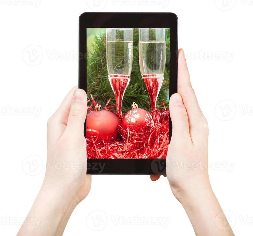 take photo of red Xmas still life with tablet pc