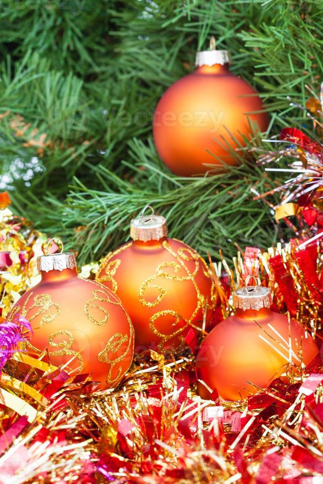 orange Christmas balls, red tinsel on Xmas tree 1 photo