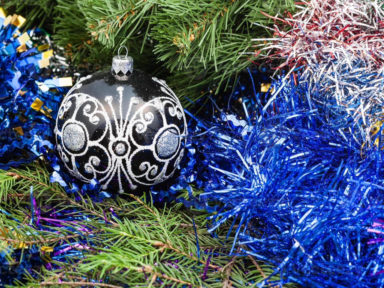 black glass Christmas balls, tinsel, Xmas tree 1 photo