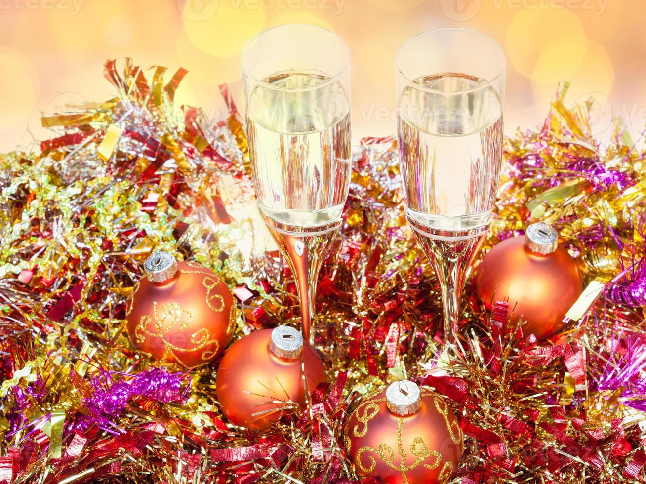 above view glasses, gold Xmass balls on tinsel photo