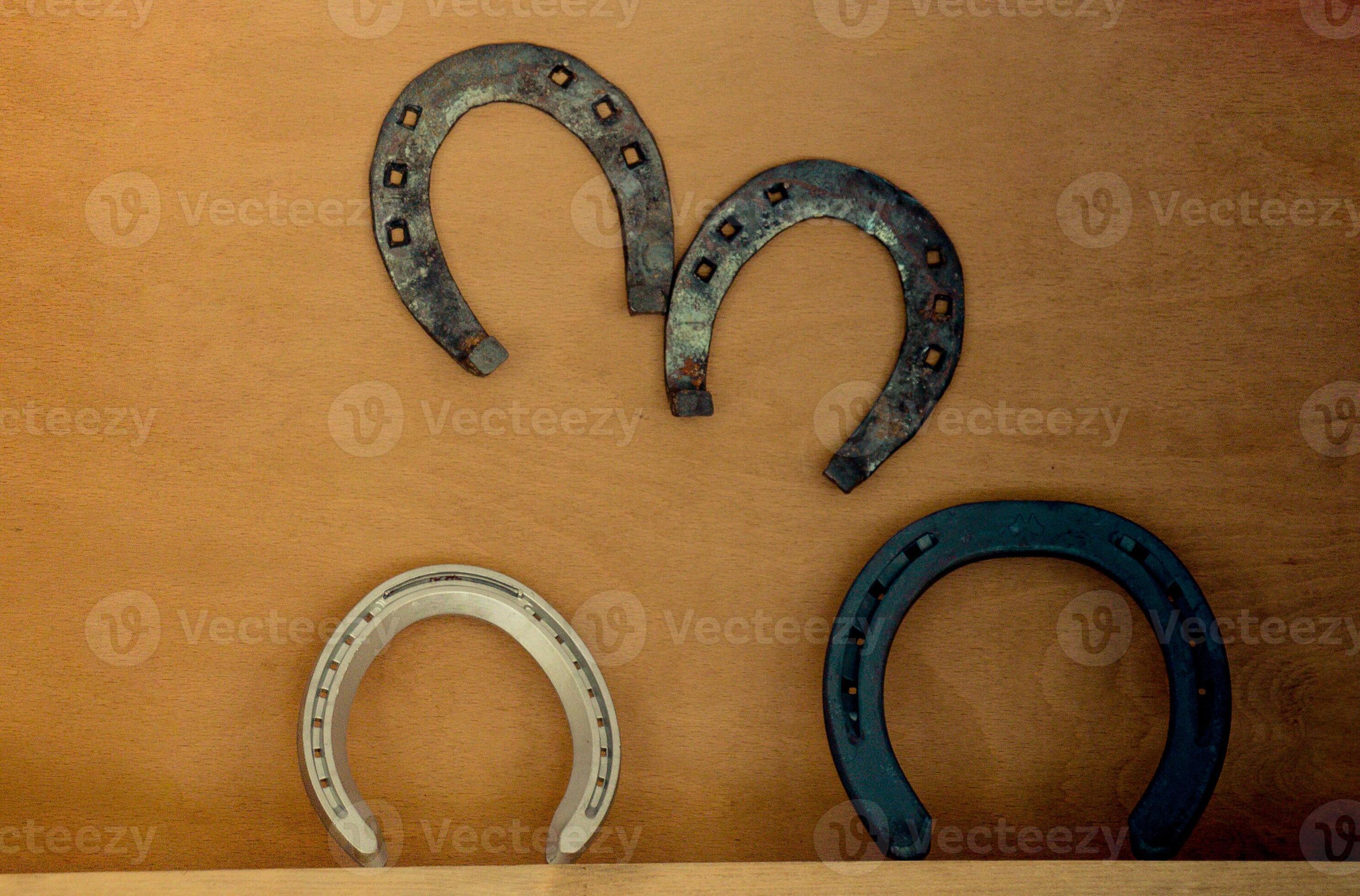Lucky horseshoes with nail holes 14496225 Stock Photo at Vecteezy