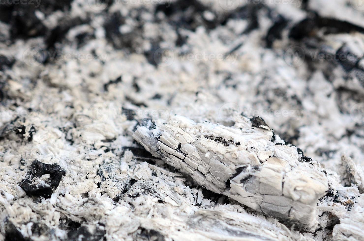 Pile of ashes after the fire went out grunge background texture photo