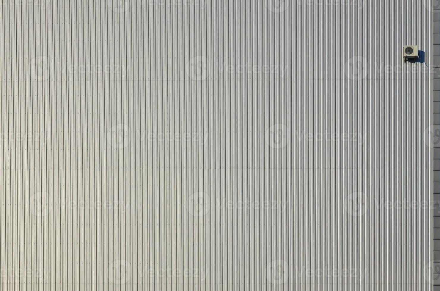 Metal siding wall with air conditioning photo