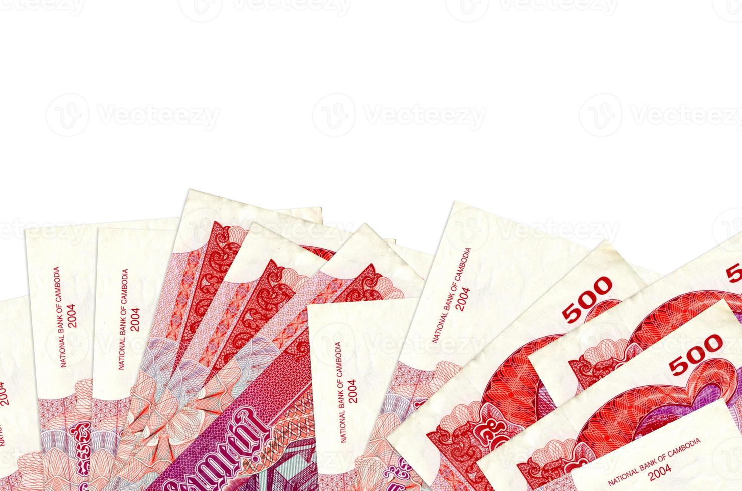 500 Cambodian riels bills lies on bottom side of screen isolated on white background with copy space. Background banner template photo