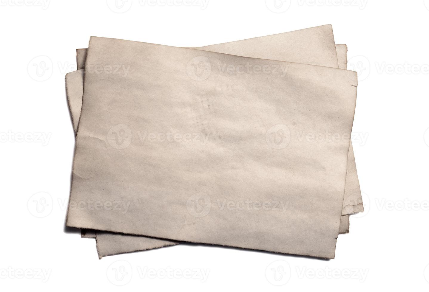 Few old blank pieces of antique vintage crumbling paper manuscript or parchment photo