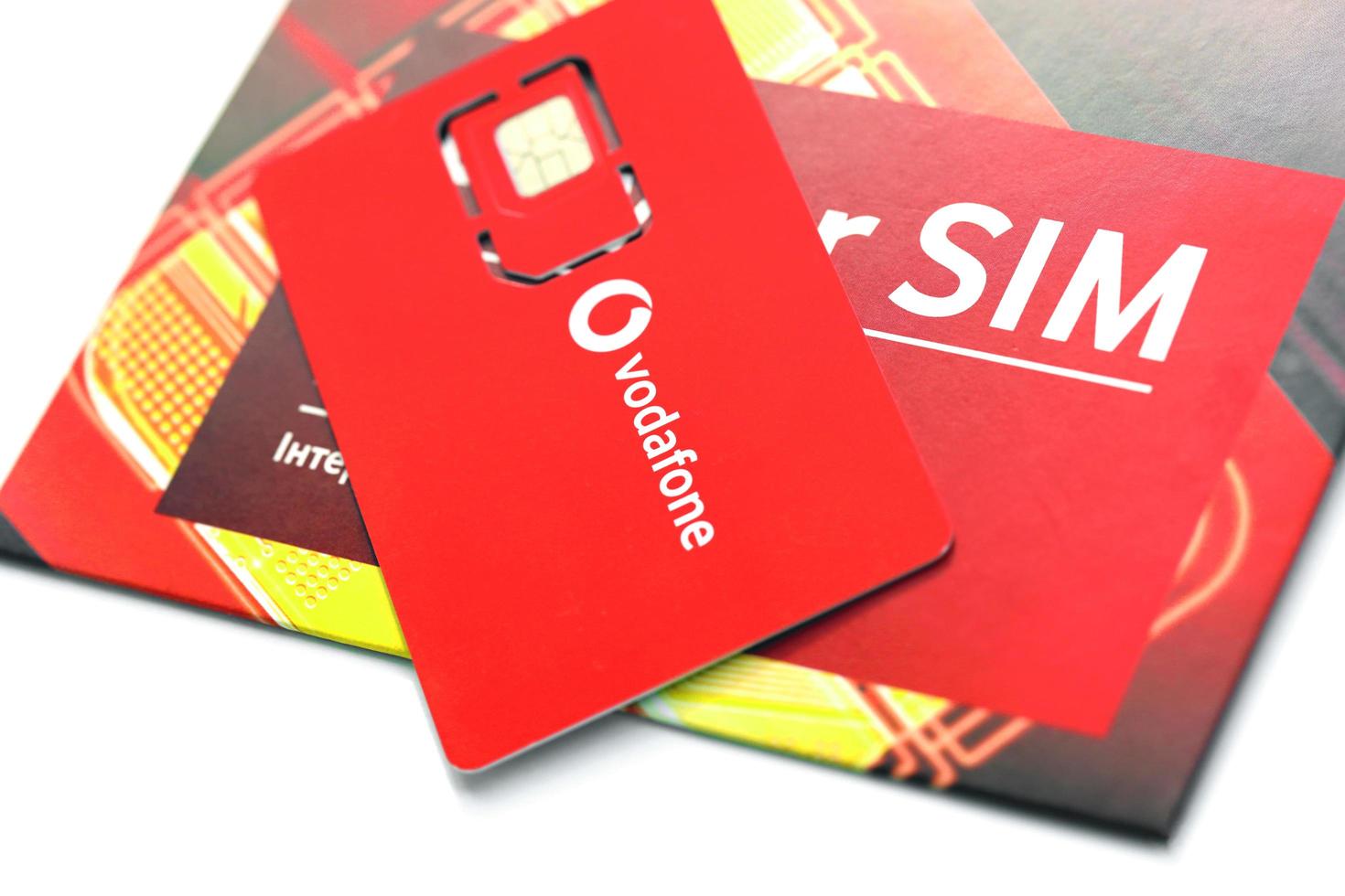 TERNOPIL, UKRAINE - JULY 5, 2022 Vodafone Power SIM mobile card by Vodafone group plc - British multinational telecommunications company who operates networks in 22 countries photo