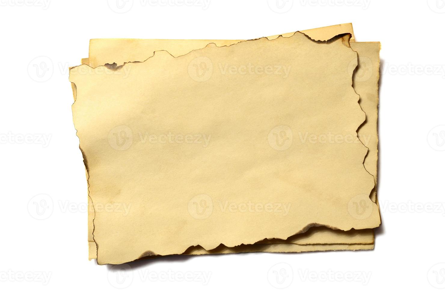 Few old blank pieces of antique vintage crumbling paper manuscript or parchment photo