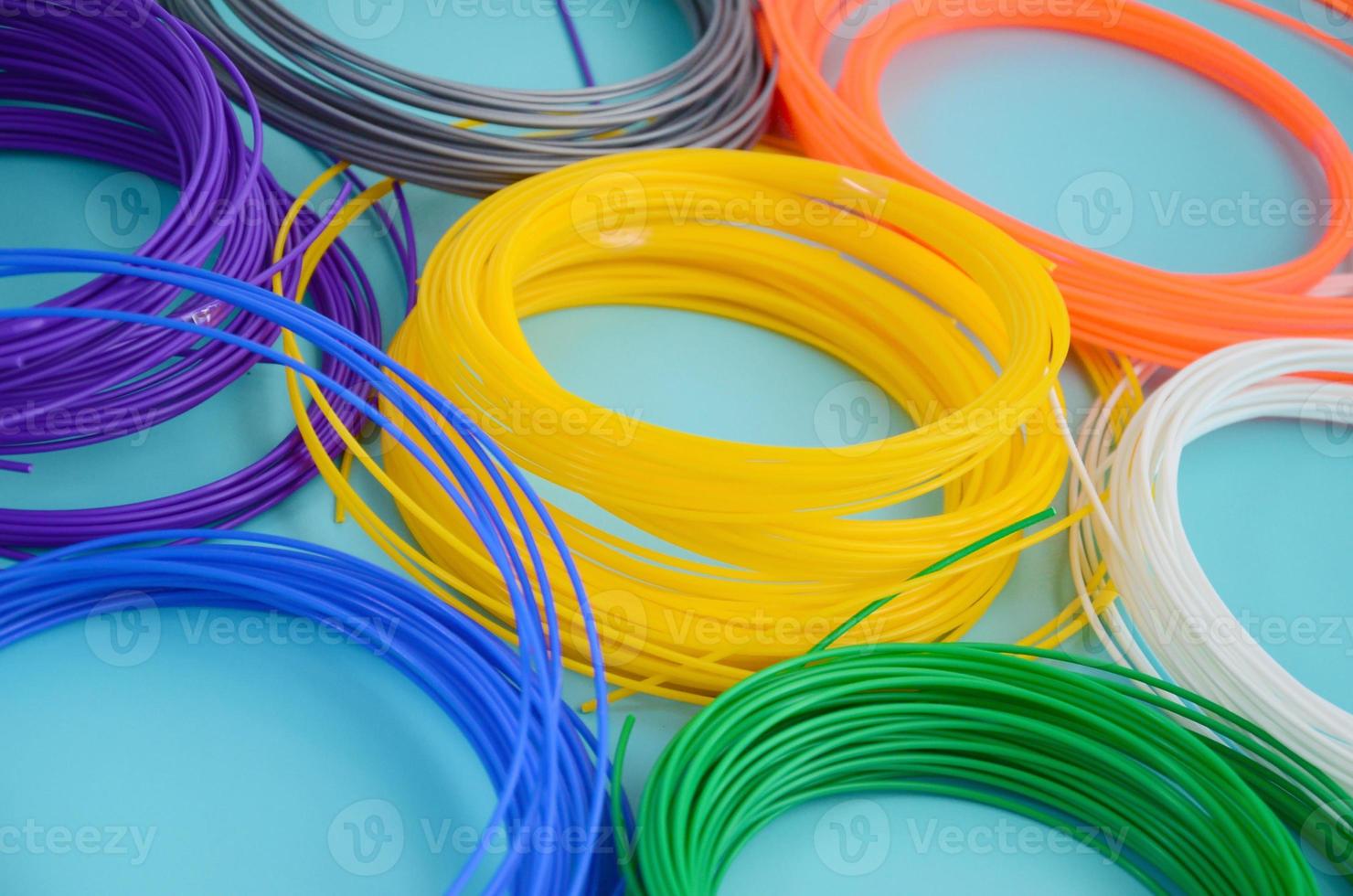 Plastic PLA and ABS filament material for printing on a 3D pen or printer of various colors photo