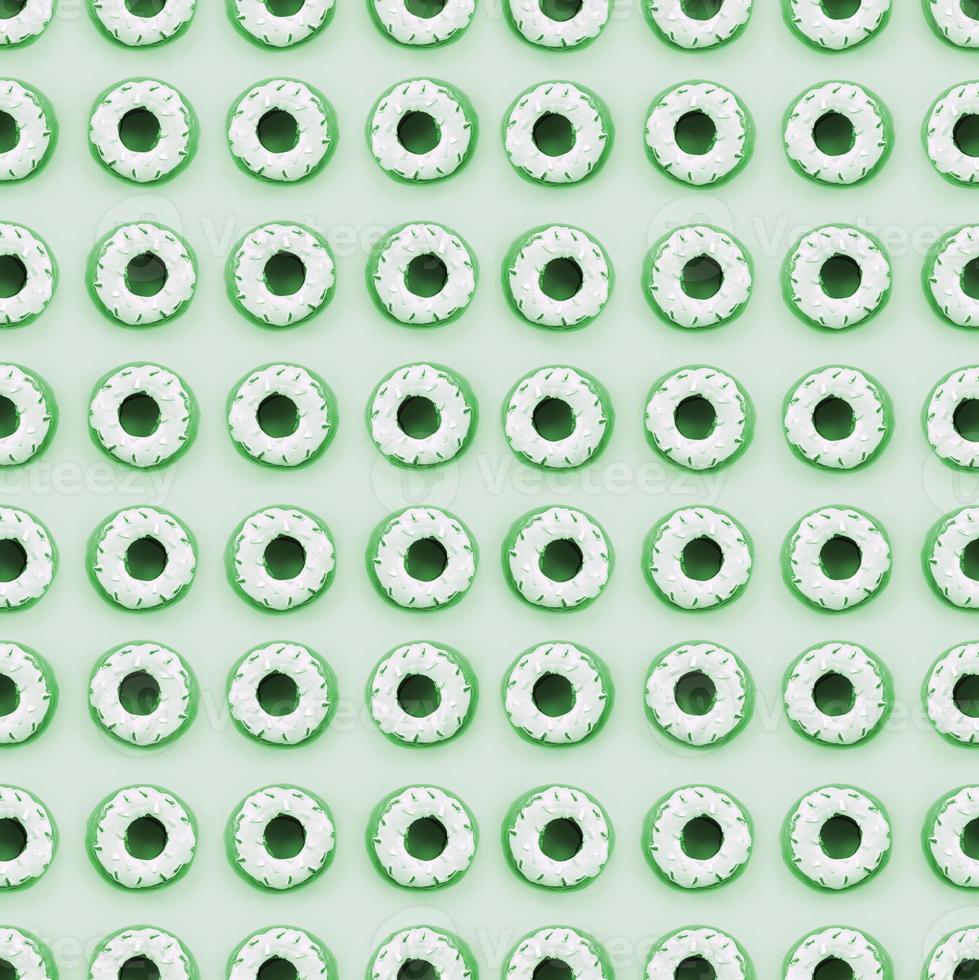 Many small plastic donuts lies on a pastel colorful background. Flat lay minimal pattern. Top view photo
