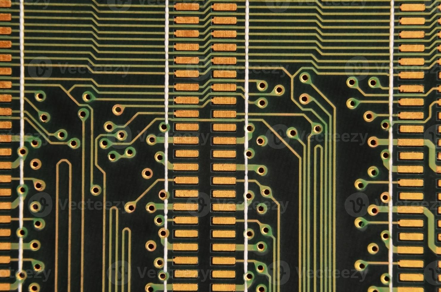 Close up of colored micro circuit board. Abstract technology background photo