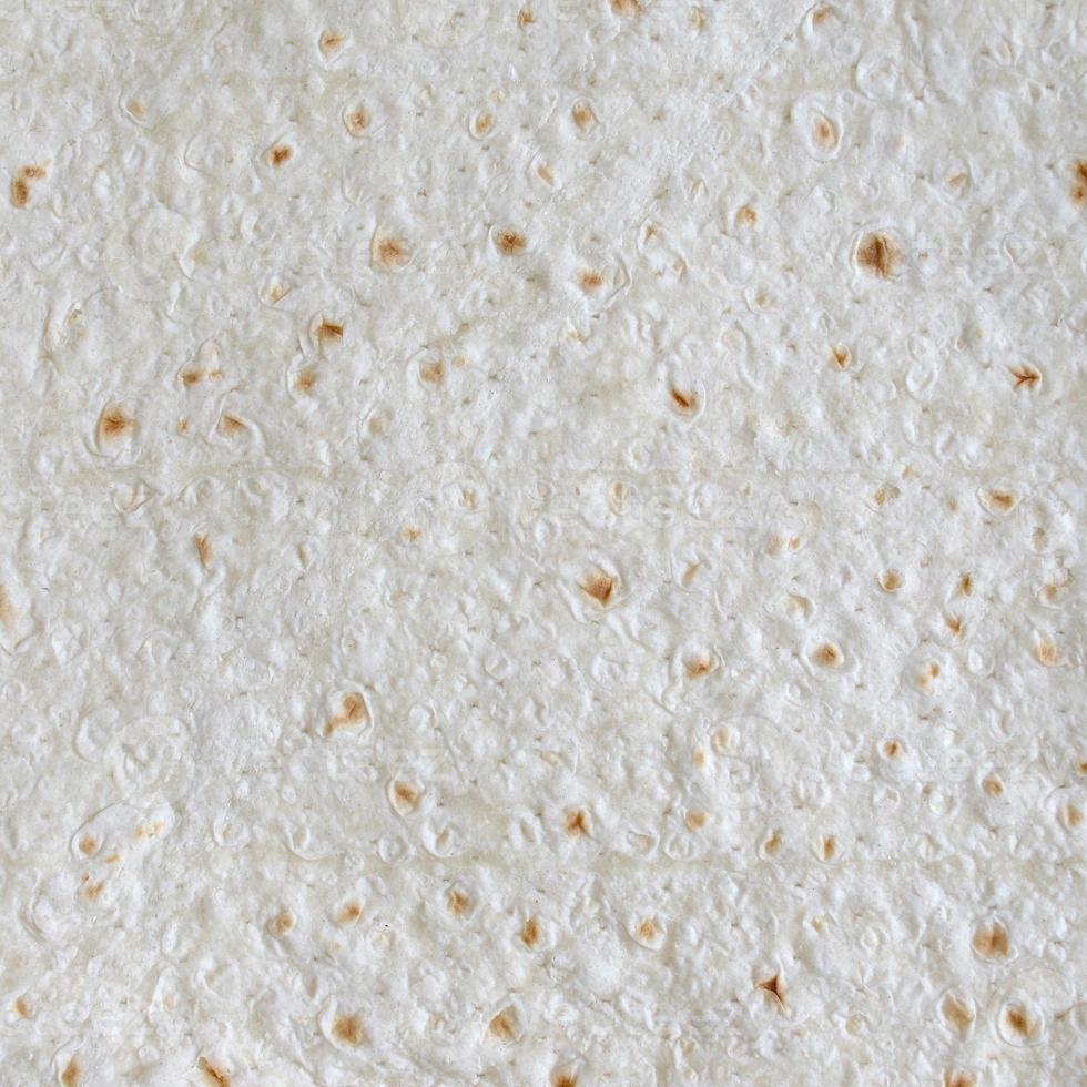 pan de pita plano casero textura de fondo de lavash turco vista superior foto