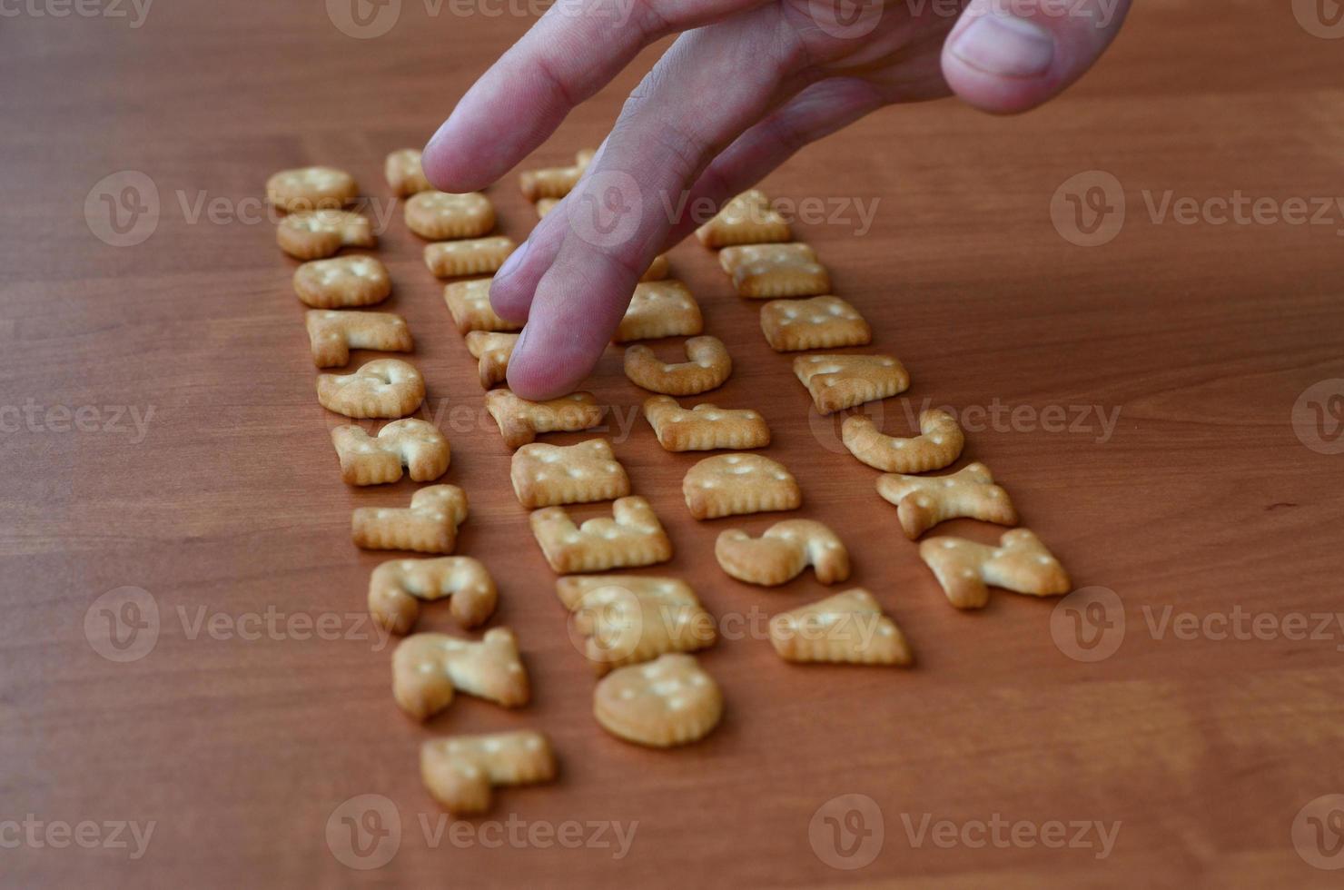 Hands on cracker keyboard buttons photo