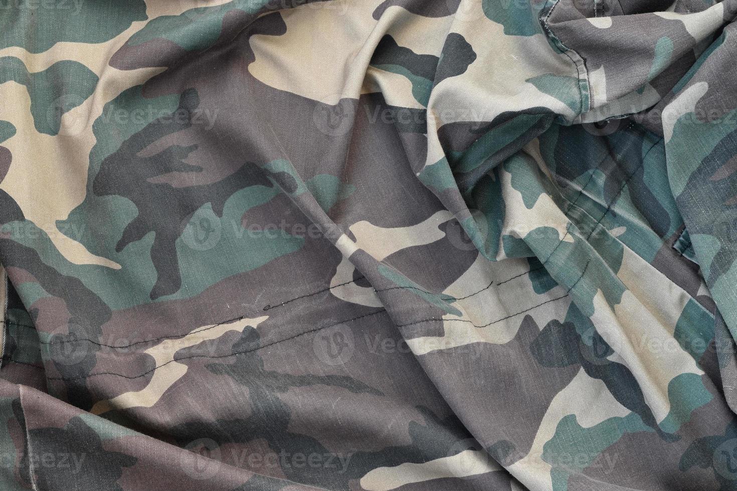 Camouflage background texture as backdrop for paintball and airsoft strikeball design projects photo