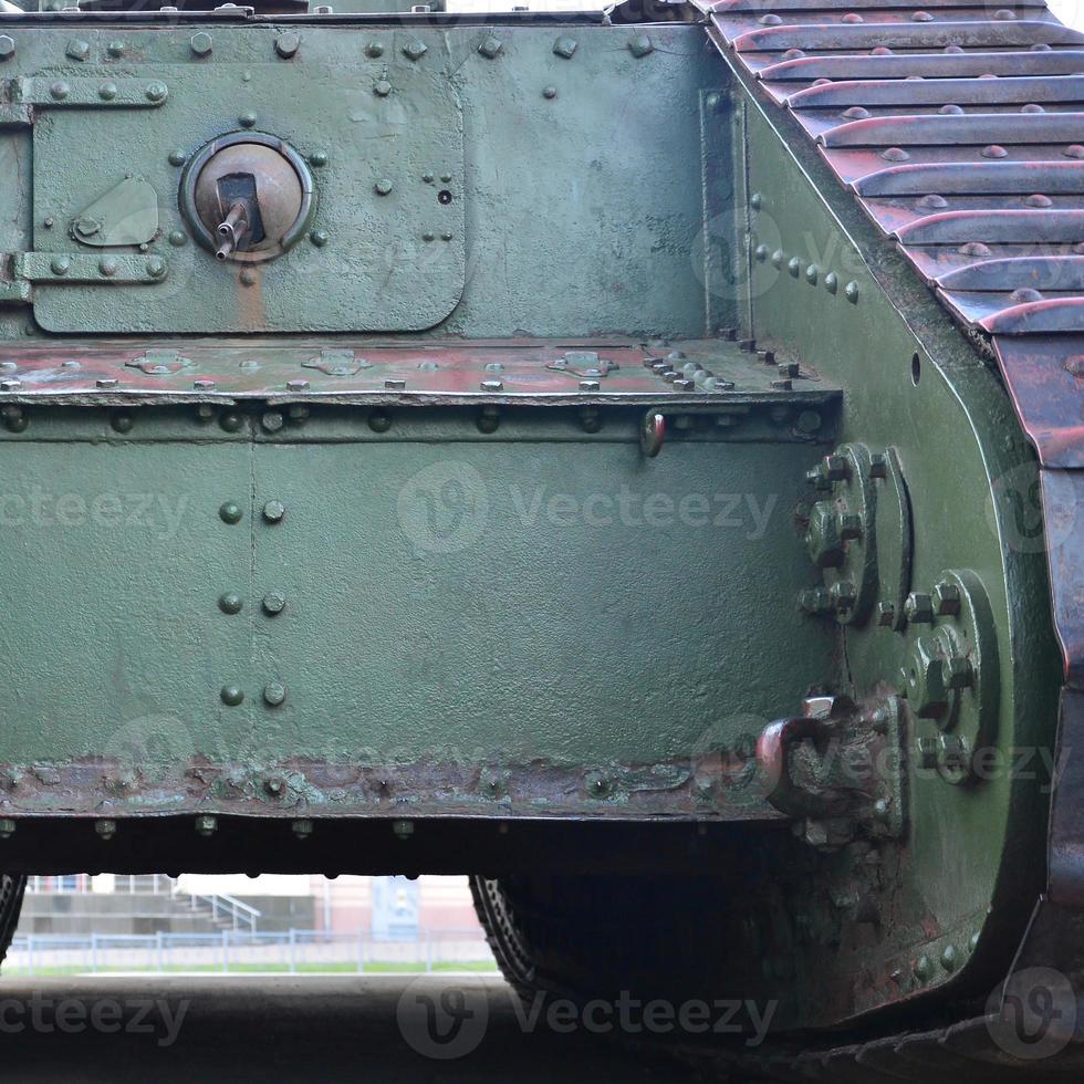 Abstract green industrial metal textured background with rivets and bolts photo