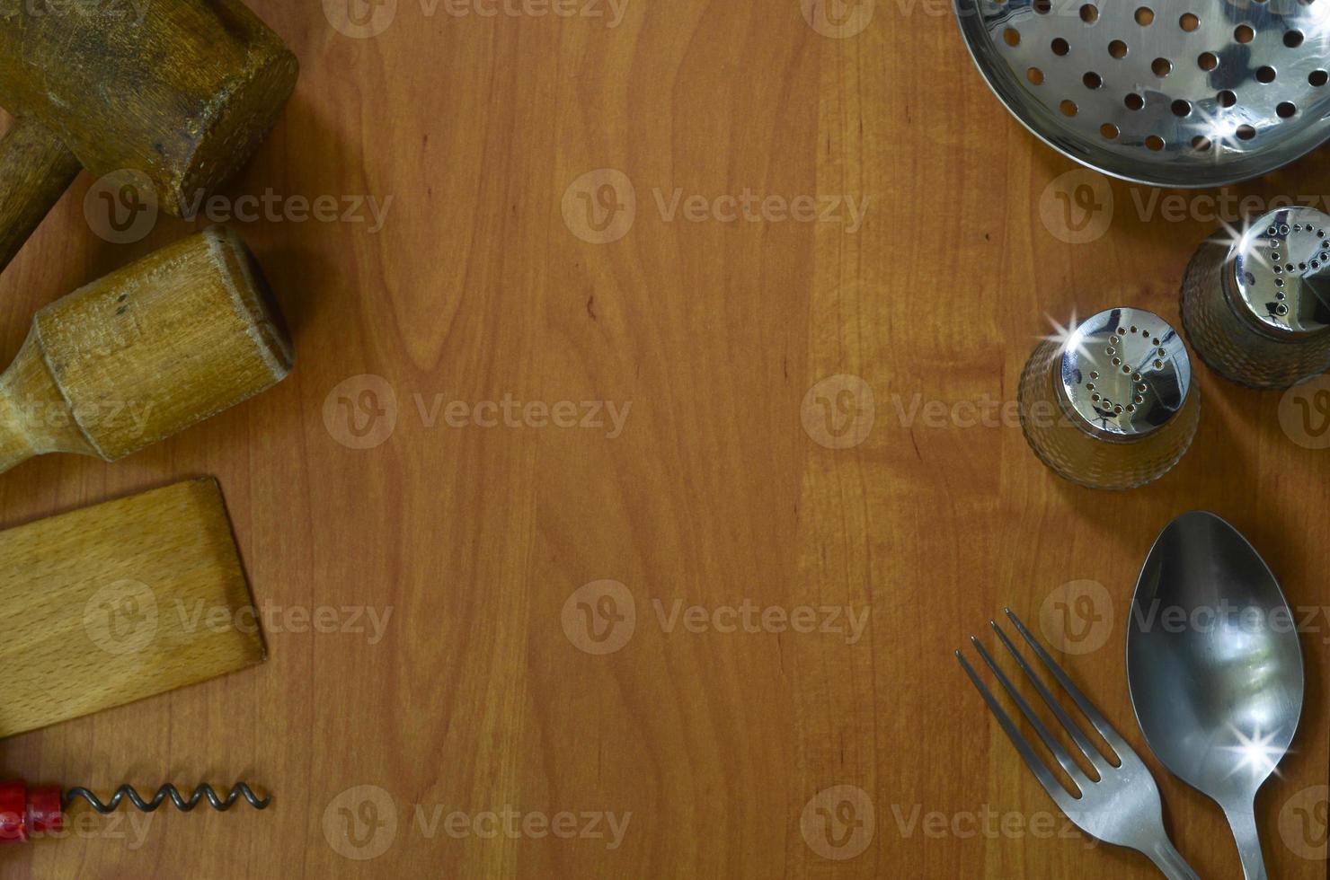 Kitchen appliances on wood background with space for text photo