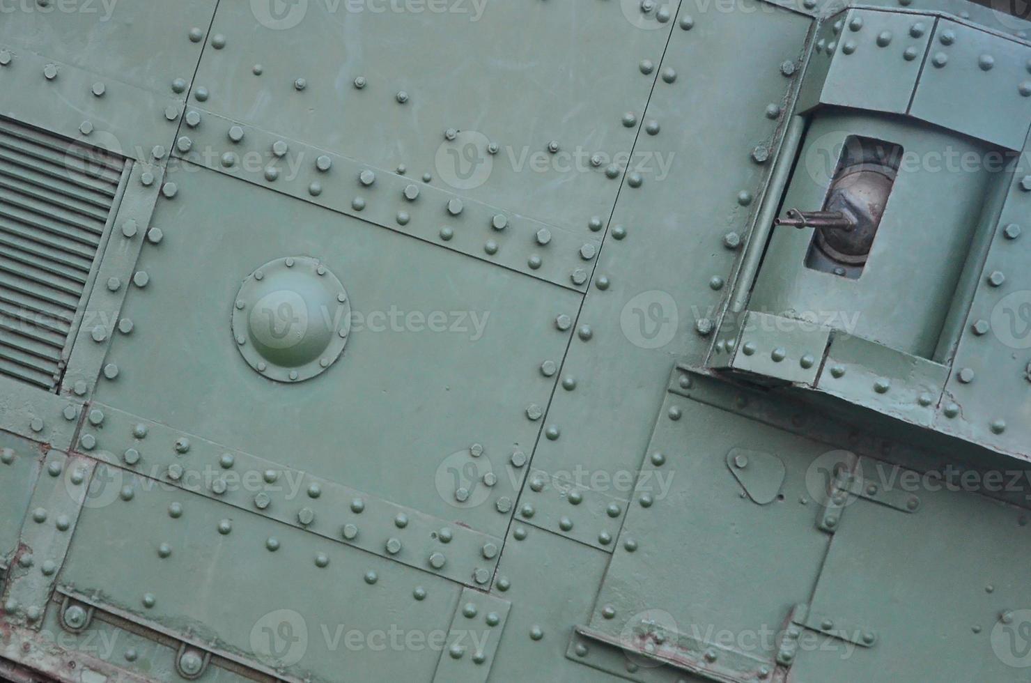 Abstract green industrial metal textured background with rivets and bolts photo