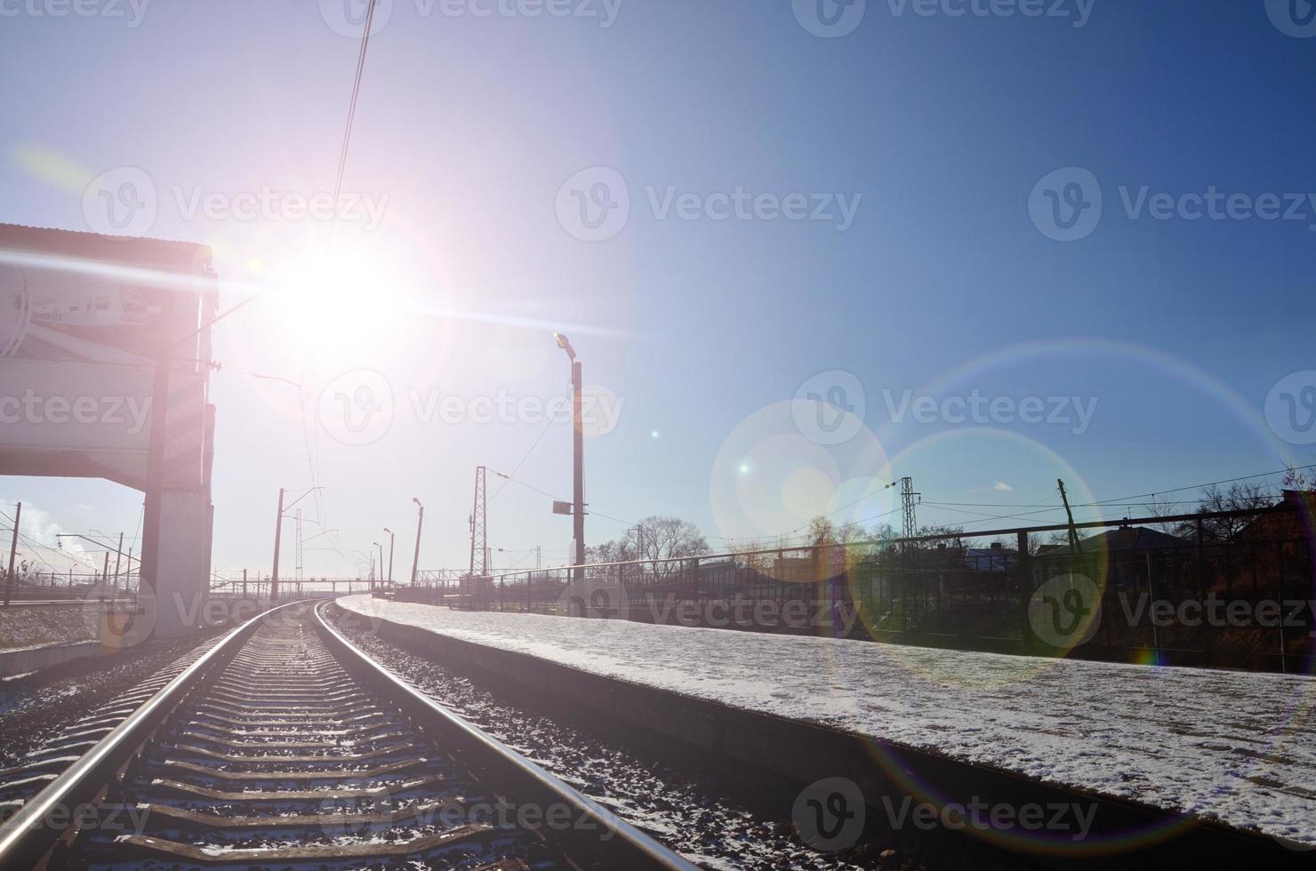 Empty railway station platform photo