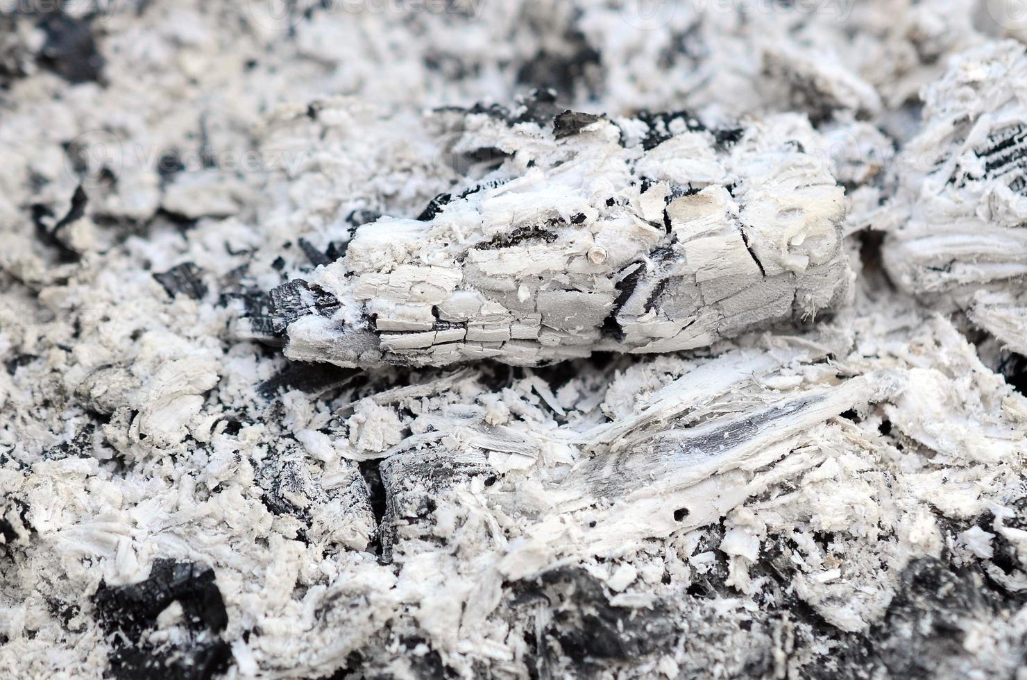 Pile of ashes after the fire went out grunge background texture photo
