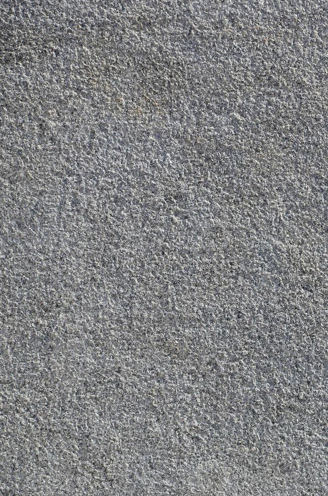 Texture of rough concrete wall with embossed texture photo
